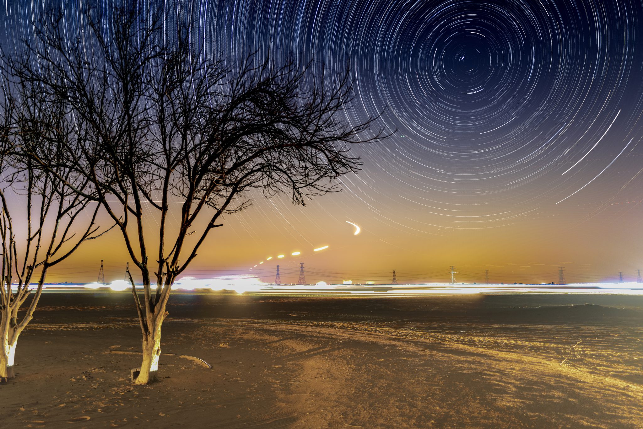 Composite photograph of star trails taken from the Al Qudra Desert on the outskirts of Dubai